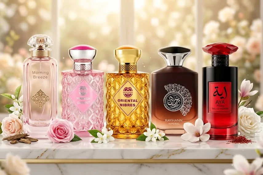 mushmush floral based perfumes placed on the marble table in a settings with different flowers and full of light.