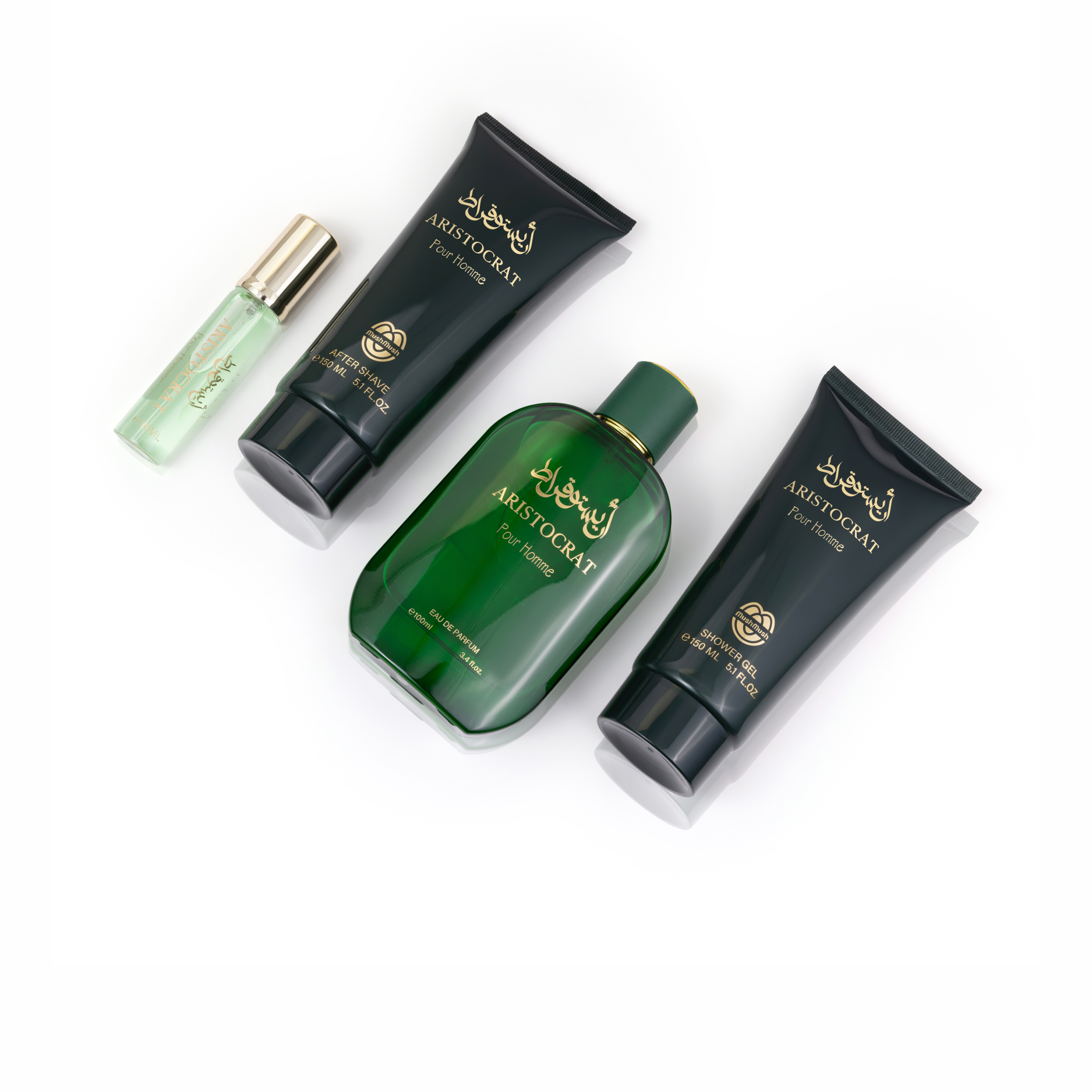 Aristocrat Pour Homme 4-piece men's fragrance gift set laid flat on a white background, featuring a deep green Eau de Parfum bottle, matching dark green shower gel and aftershave tubes with gold Arabic typography, and a travel spray with a gold cap.