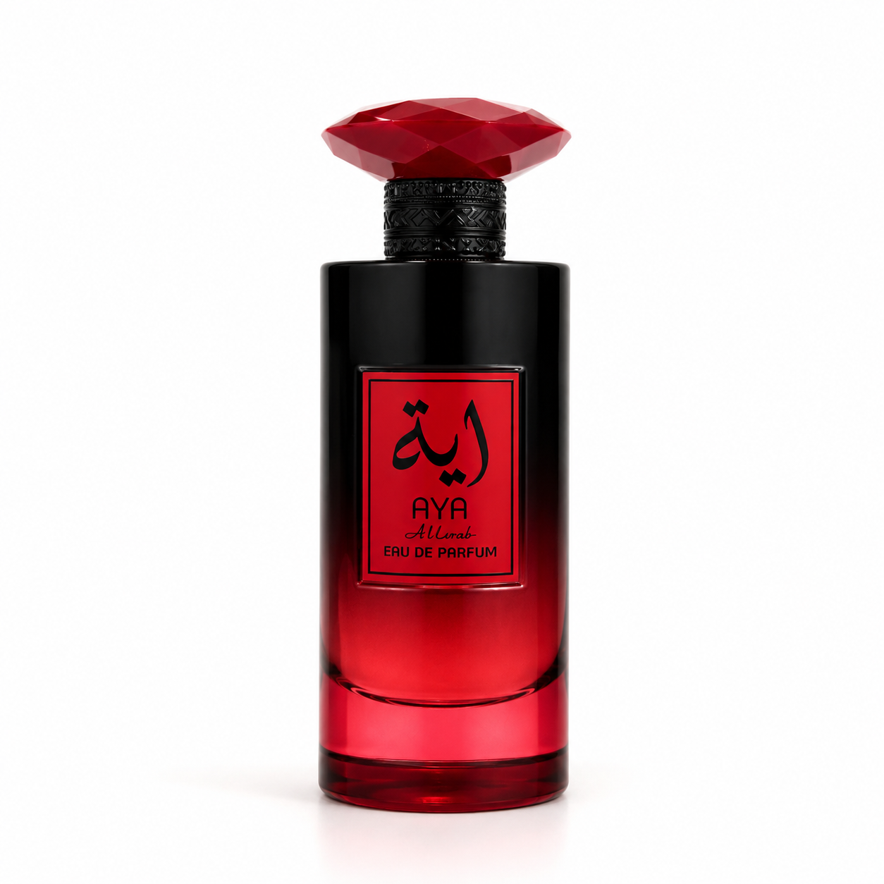 AYA Alurab Eau de Parfum cylindrical glass bottle with a black-to-ruby-red gradient finish, topped with a faceted red gem-shaped cap and ornate black collar, featuring a red-framed label with black Arabic calligraphy.