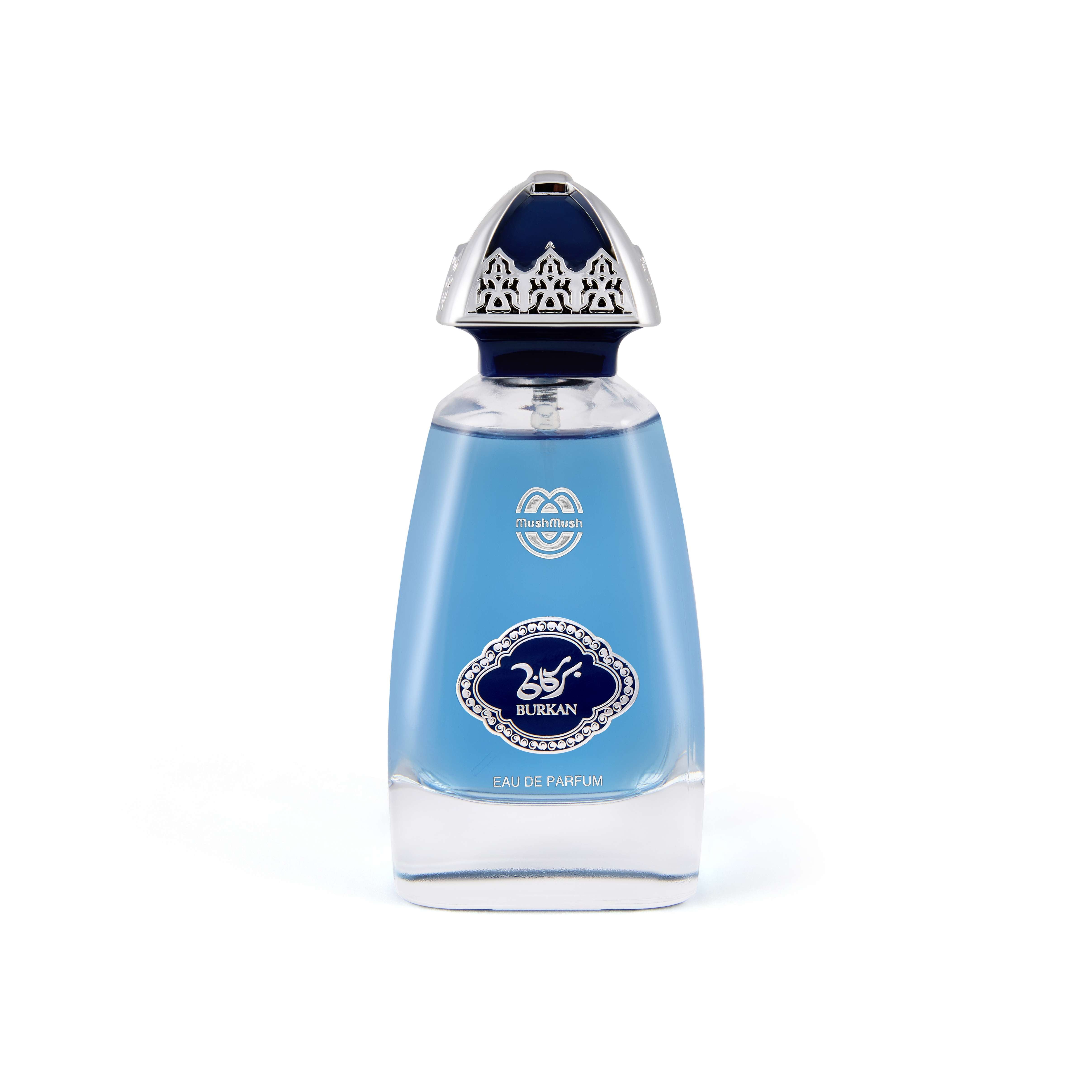 BURKAN Eau de Parfum clear glass bottle filled with light blue liquid, featuring a royal blue oval crest with silver filigree bordering and Arabic calligraphy, topped with an ornate silver and dark blue dome cap.