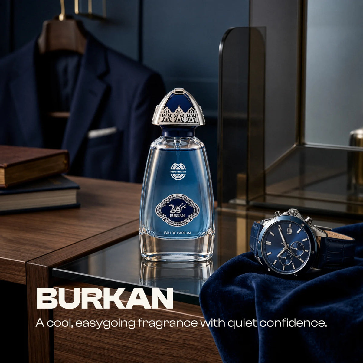 Burkan for men perfume bottle on a dressing table beside a navy suit and watch