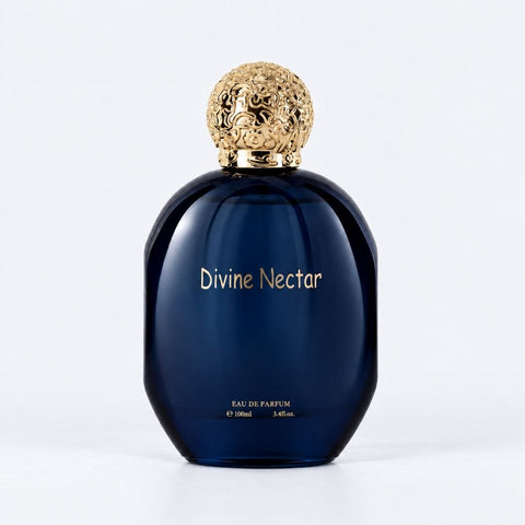 MUSHMUSH Divine Nectar Eau de Parfum 100ml, premium luxury fragrance in a deep navy bottle with ornate gold sculpted cap.