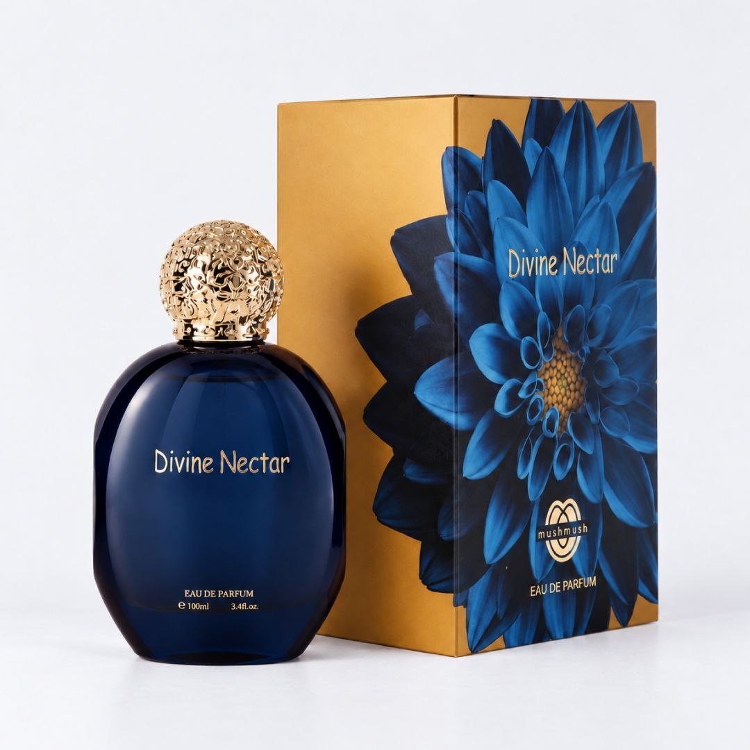 MUSHMUSH Divine Nectar Eau de Parfum 100ml for women, premium floral fragrance in a deep navy bottle with ornate gold cap and blue-flower packaging.