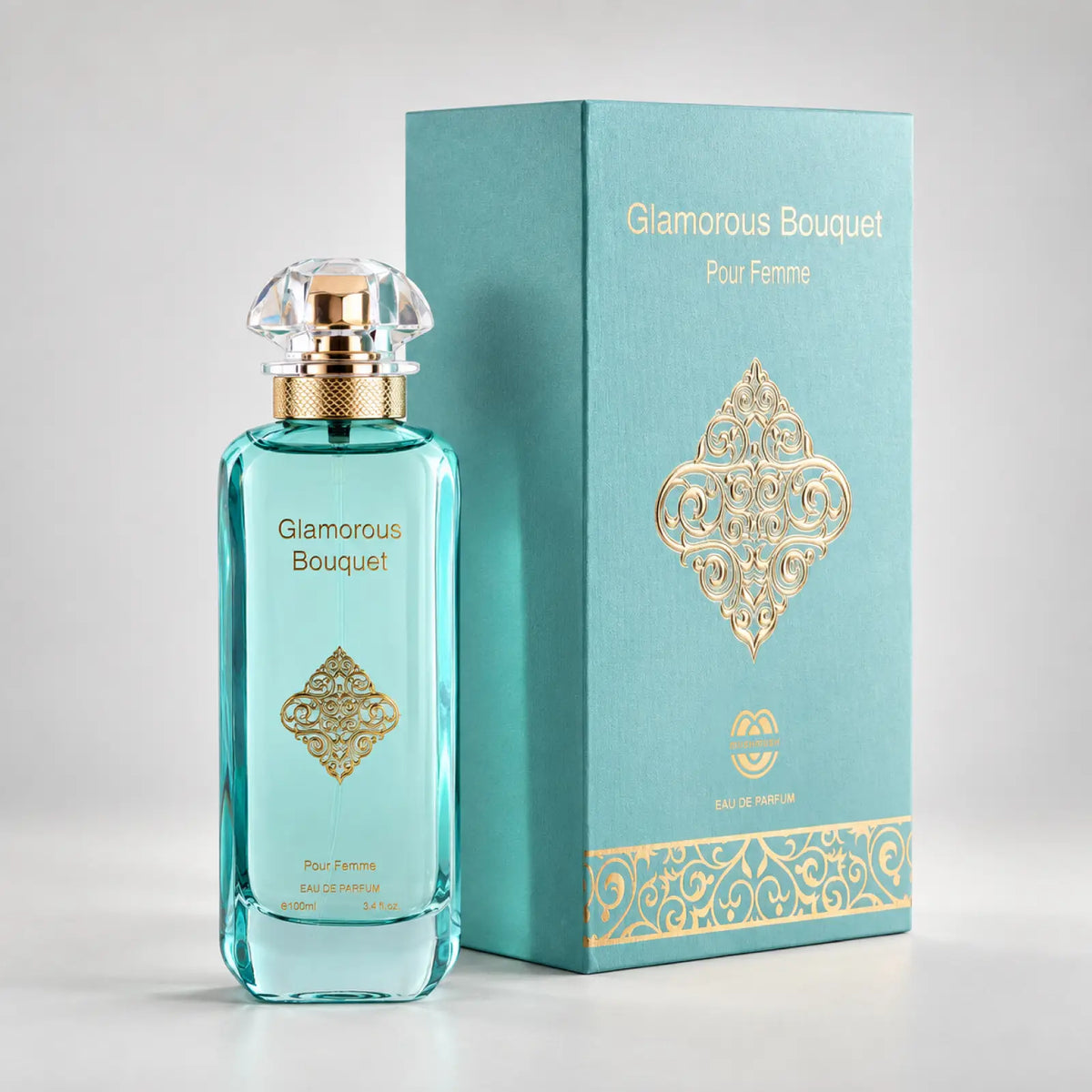 MUSHMUSH Glamorous Bouquet perfume bottle beside its turquoise presentation box.