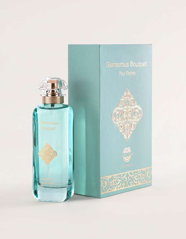 MUSHMUSH Glamorous Bouquet women perfume, 100ml Eau de Parfum, affordable luxury fragrance with aqua blue bottle, gold details and elegant matching perfume box.