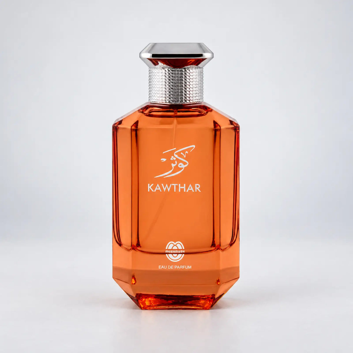 Kawthar faceted amber perfume bottle with a silver diamond-shaped cap by MUSHMUSH