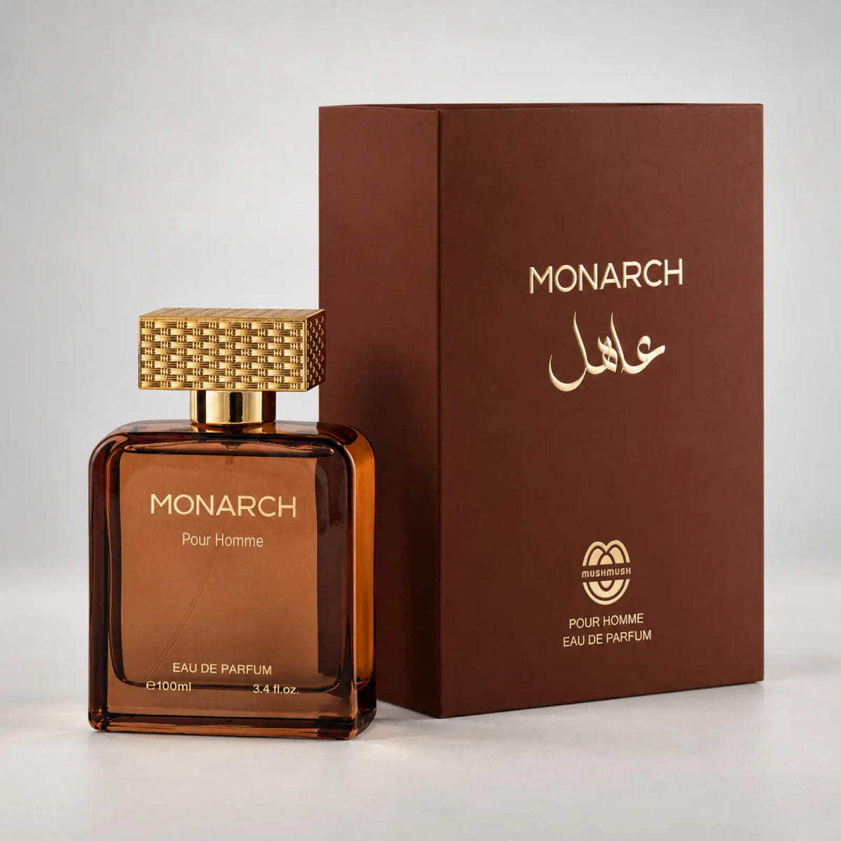 MUSHMUSH Monarch perfume bottle beside its brown presentation box.