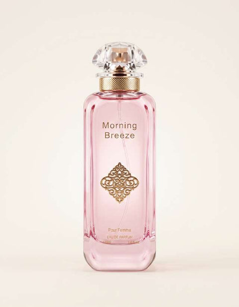 MUSHMUSH Morning Breeze ladies fragrance, 100ml EDP, elegant feminine scent in a blush pink perfume bottle with ornate gold emblem, clear jewel cap and refined luxury design.