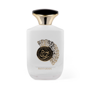 RAYHANN Eau de Parfum matte white bottle featuring a gold flared cap with a black top, decorated with a central gold and black ornate Arabic calligraphy emblem.