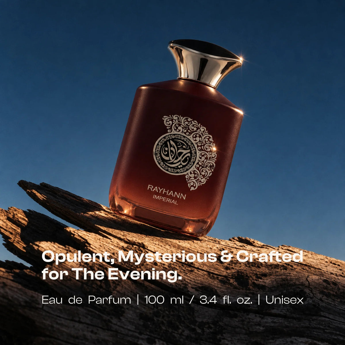 Rayhann Imperial perfume bottle on driftwood against a deep blue background