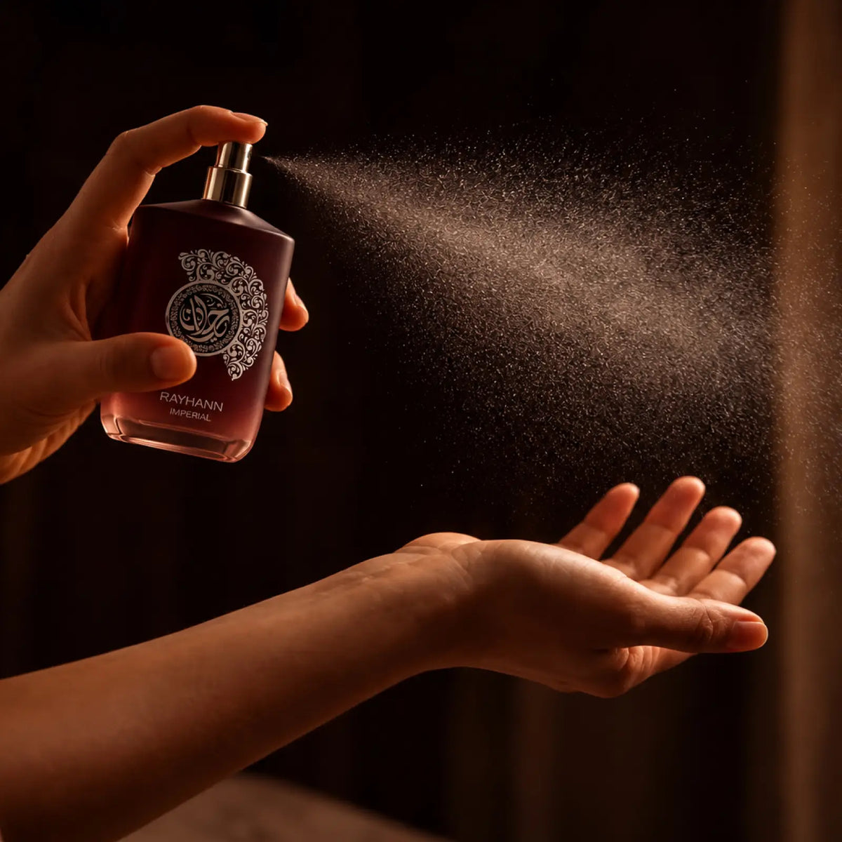 Rayhann Imperial for men and women perfume being sprayed onto an open palm