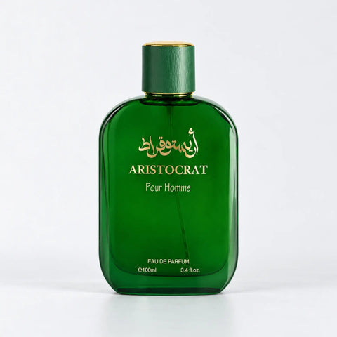 Aristocrat Pour Homme emerald green perfume bottle with a green cap and gold Arabic script by MUSHMUSH