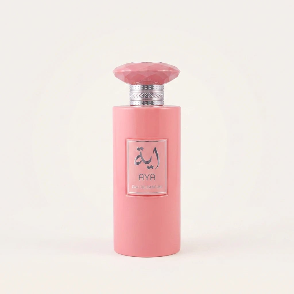 AYA matte pink perfume bottle with a pink gem cap and silver collar by MUSHMUSH