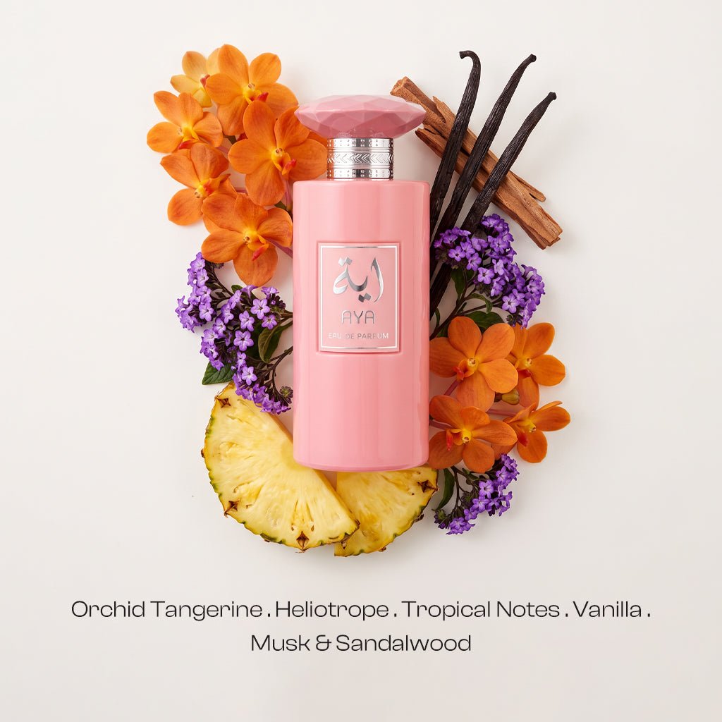 AYA for women perfume bottle surrounded by visible orchid, pineapple, vanilla and tropical flowers