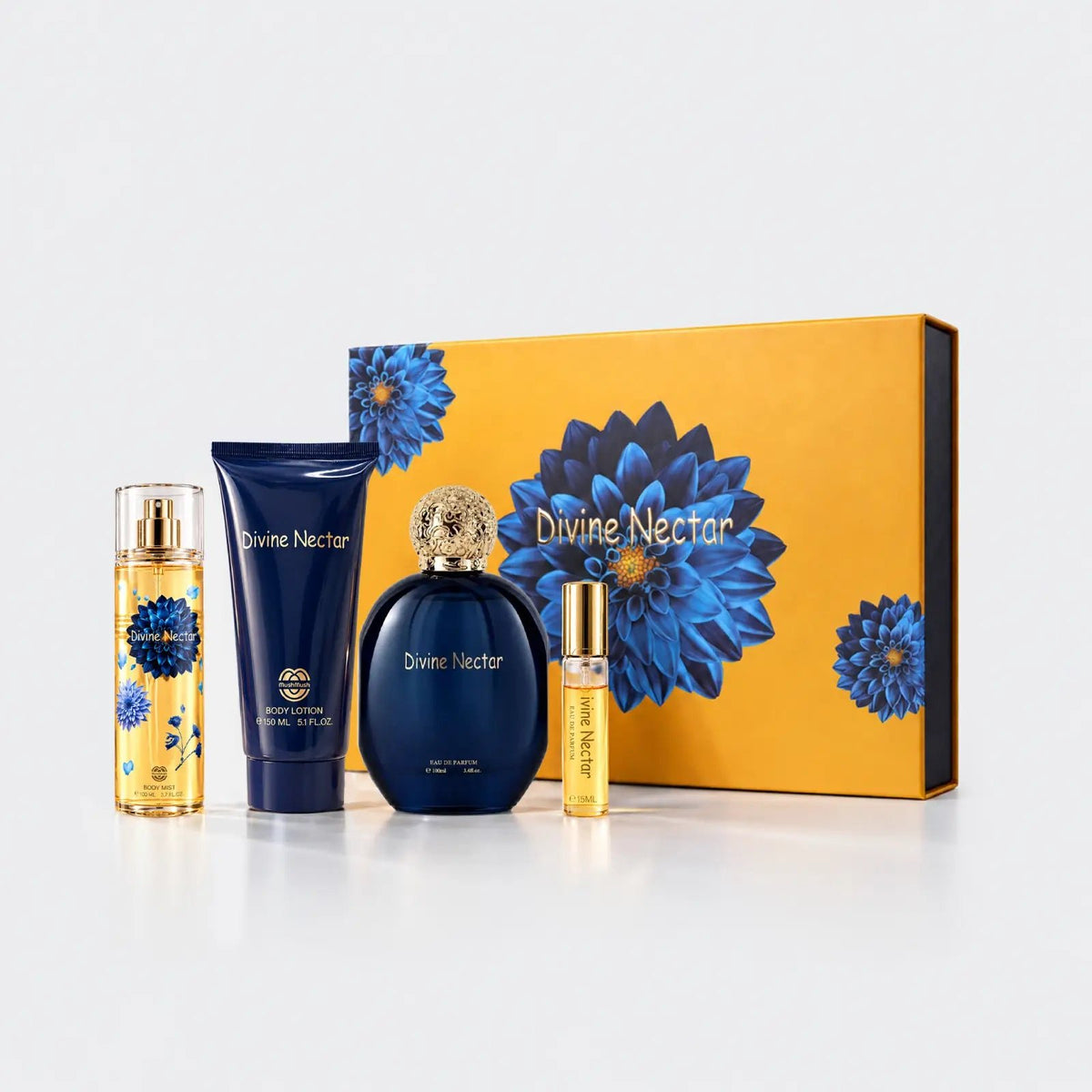 Divine Nectar perfume, lotion, mist and travel spray beside its yellow dahlia box by MUSHMUSH