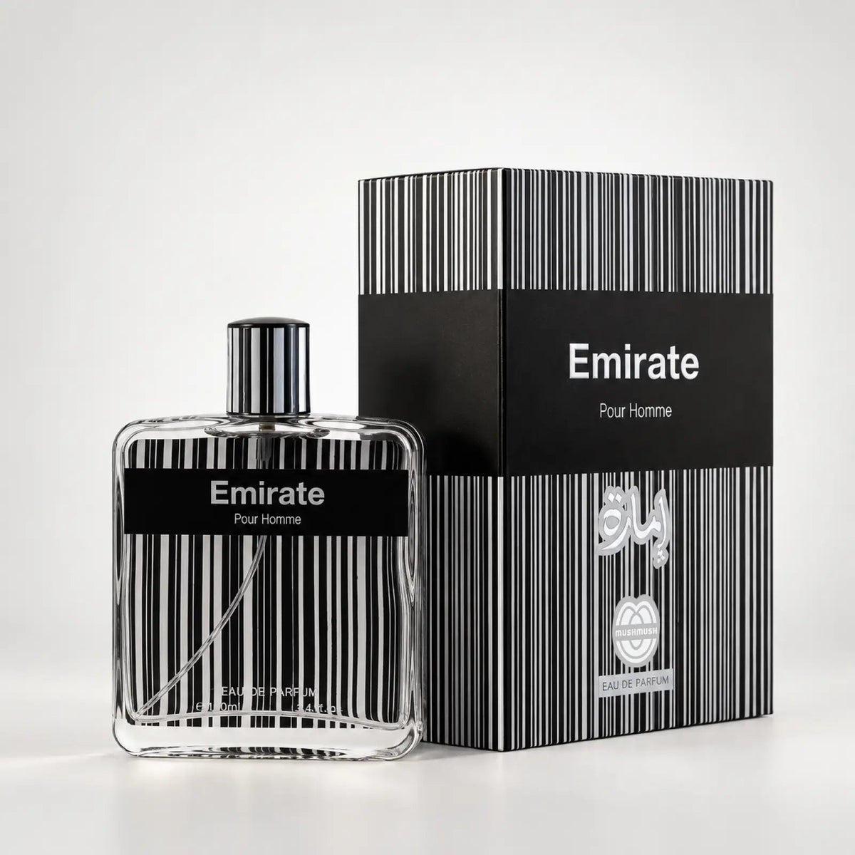 MUSHMUSH Emirate perfume bottle beside its black striped presentation box.