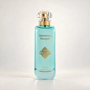 Glamorous Bouquet Pour Femme aqua bottle with a crystal cap and gold diamond filigree by MUSHMUSH