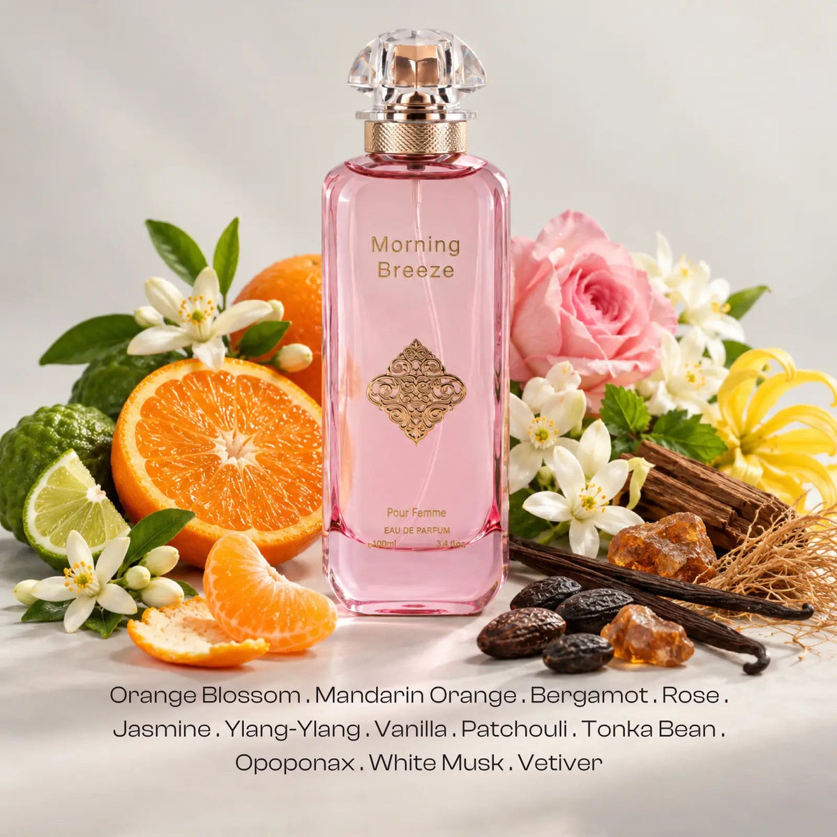Morning Breeze for women perfume bottle surrounded by visible orange blossom, rose, citrus and vanilla
