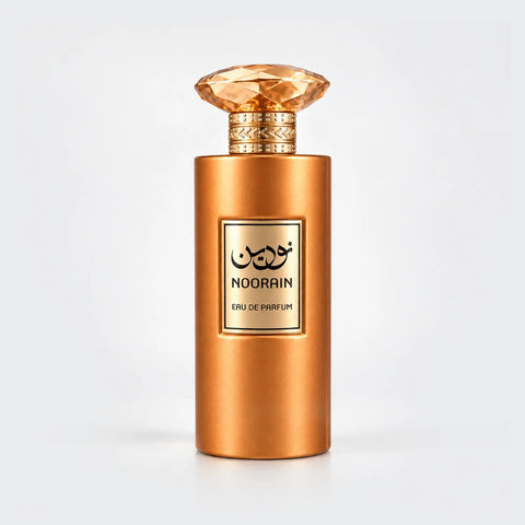 Noorain for women gold perfume bottle with a faceted amber cap and gold label by MUSHMUSH